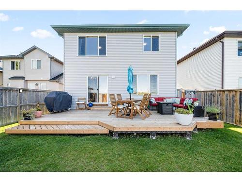 65 Crystal Shores Crescent, Okotoks, AB - Outdoor With Deck Patio Veranda With Exterior