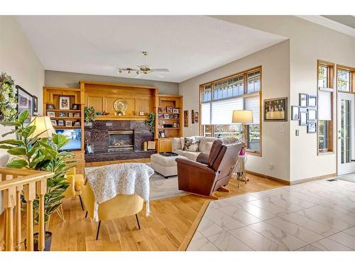 32 Valley Ponds Place Nw, Calgary, AB - Indoor Photo Showing Living Room With Fireplace