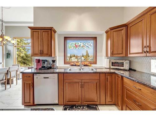 32 Valley Ponds Place Nw, Calgary, AB - Indoor Photo Showing Kitchen With Double Sink