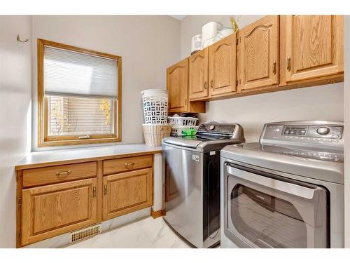 32 Valley Ponds Place Nw, Calgary, AB - Indoor Photo Showing Laundry Room