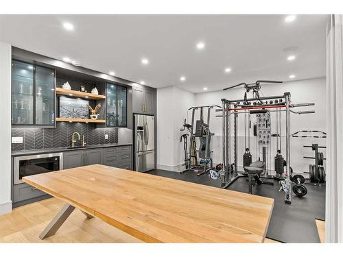 1473 Coopers Landing Sw, Airdrie, AB - Indoor Photo Showing Gym Room