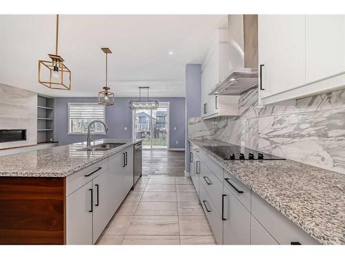 107 Legacy Landing Se, Calgary, AB - Indoor Photo Showing Kitchen With Double Sink With Upgraded Kitchen