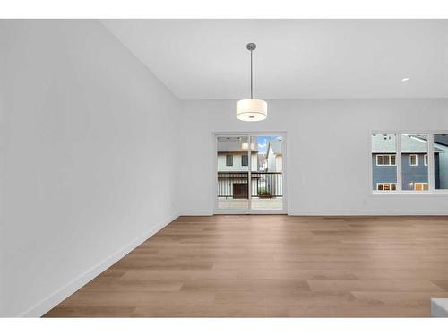 313 Baneberry Way Sw, Airdrie, AB - Indoor Photo Showing Living Room