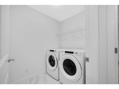 313 Baneberry Way Sw, Airdrie, AB - Indoor Photo Showing Laundry Room