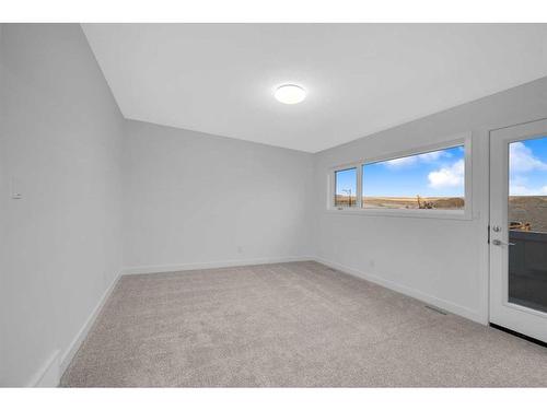 313 Baneberry Way Sw, Airdrie, AB - Indoor Photo Showing Other Room