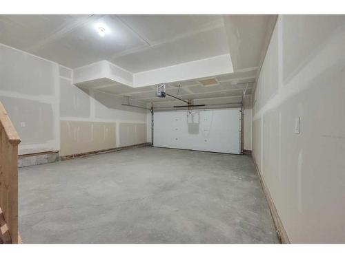 313 Baneberry Way Sw, Airdrie, AB - Indoor Photo Showing Garage