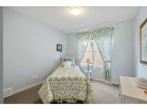 32 St Moritz Terrace Sw, Calgary, AB - Indoor Photo Showing Bedroom