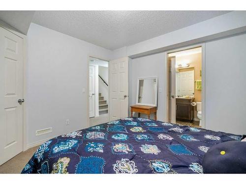 32 St Moritz Terrace Sw, Calgary, AB - Indoor Photo Showing Bedroom