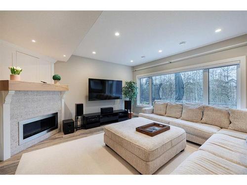 42 Tuscany Estates Crescent Nw, Calgary, AB - Indoor Photo Showing Living Room With Fireplace