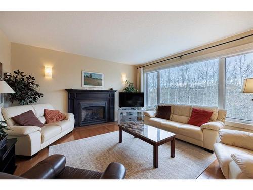 42 Tuscany Estates Crescent Nw, Calgary, AB - Indoor Photo Showing Living Room With Fireplace