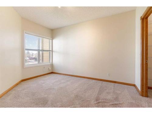 230-1920 14 Avenue Ne, Calgary, AB - Indoor Photo Showing Other Room