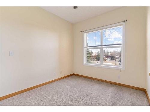 230-1920 14 Avenue Ne, Calgary, AB - Indoor Photo Showing Other Room