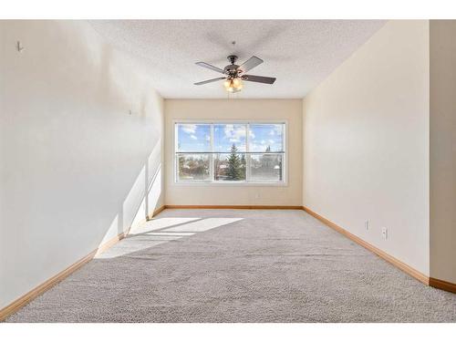 230-1920 14 Avenue Ne, Calgary, AB - Indoor Photo Showing Other Room