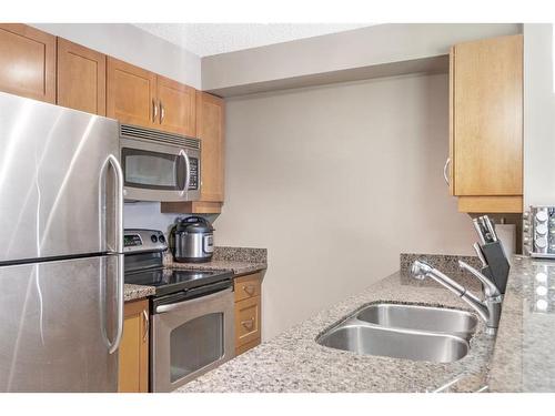 4310-60 Panatella Street Nw, Calgary, AB - Indoor Photo Showing Kitchen With Stainless Steel Kitchen With Double Sink