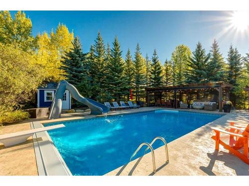 111 Woodland Lane, Rural Rocky View County, AB - Outdoor With In Ground Pool With Backyard