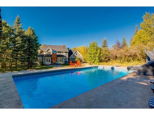 111 Woodland Lane, Rural Rocky View County, AB - Outdoor With In Ground Pool With Backyard