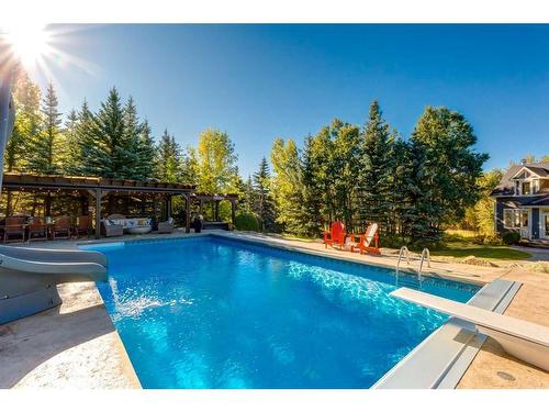 111 Woodland Lane, Rural Rocky View County, AB - Outdoor With In Ground Pool With Backyard