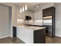 1313-95 Burma Star Road Sw, Calgary, AB  - Indoor Photo Showing Kitchen With Upgraded Kitchen 