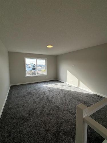 1607 Baywater Street Sw, Airdrie, AB - Indoor Photo Showing Other Room