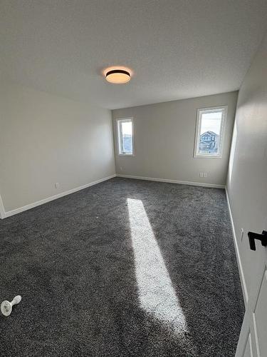 1607 Baywater Street Sw, Airdrie, AB - Indoor Photo Showing Other Room