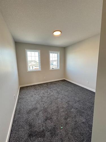 1607 Baywater Street Sw, Airdrie, AB - Indoor Photo Showing Other Room