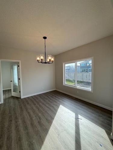 1607 Baywater Street Sw, Airdrie, AB - Indoor Photo Showing Other Room