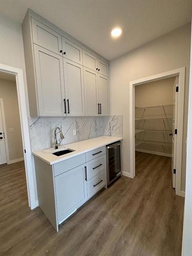 1607 Baywater Street Sw, Airdrie, AB - Indoor Photo Showing Kitchen