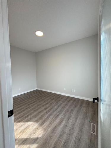 1607 Baywater Street Sw, Airdrie, AB - Indoor Photo Showing Other Room