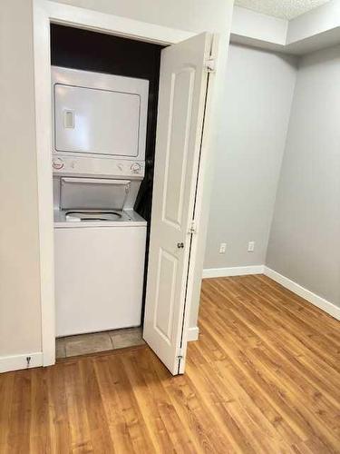 206-323 18 Avenue Sw, Calgary, AB - Indoor Photo Showing Laundry Room