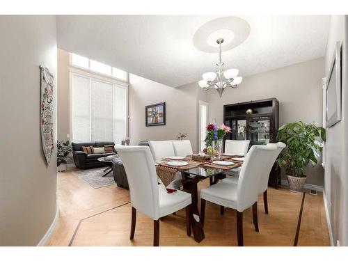 75 West Cedar Rise Sw, Calgary, AB - Indoor Photo Showing Dining Room