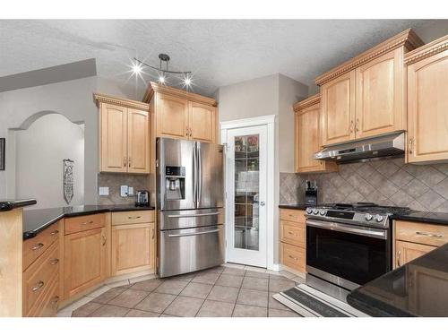 75 West Cedar Rise Sw, Calgary, AB - Indoor Photo Showing Kitchen With Stainless Steel Kitchen