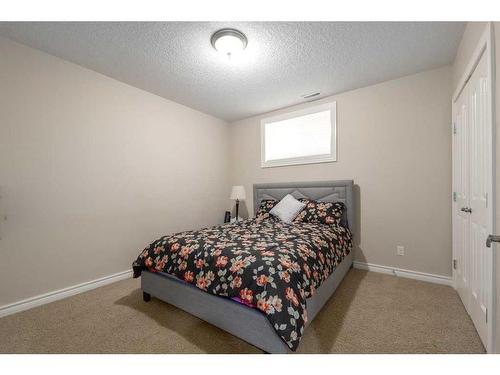 75 West Cedar Rise Sw, Calgary, AB - Indoor Photo Showing Bedroom