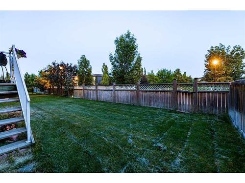 75 West Cedar Rise Sw, Calgary, AB - Outdoor With Backyard