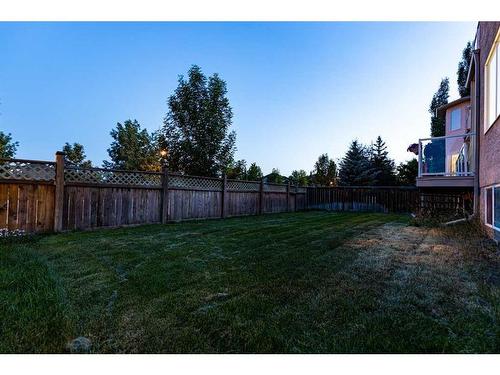 75 West Cedar Rise Sw, Calgary, AB - Outdoor With Backyard