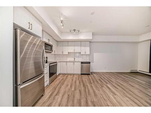 3116-3727 Sage Hill Drive Nw, Calgary, AB - Indoor Photo Showing Kitchen With Upgraded Kitchen