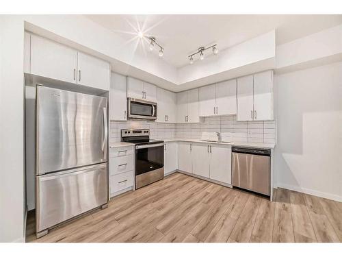 3116-3727 Sage Hill Drive Nw, Calgary, AB - Indoor Photo Showing Kitchen With Upgraded Kitchen