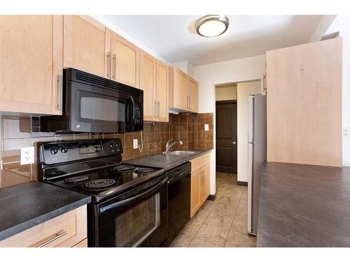 202-620 15 Avenue Sw, Calgary, AB - Indoor Photo Showing Kitchen