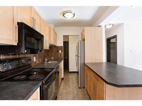 202-620 15 Avenue Sw, Calgary, AB - Indoor Photo Showing Kitchen