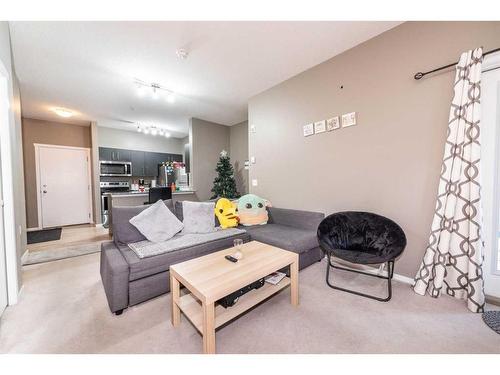 4113-4641 128 Avenue Ne, Calgary, AB - Indoor Photo Showing Living Room