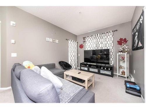 4113-4641 128 Avenue Ne, Calgary, AB - Indoor Photo Showing Living Room