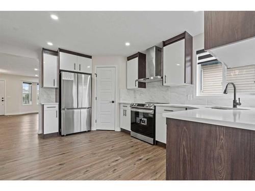 135 Mt Apex Crescent Se, Calgary, AB - Indoor Photo Showing Kitchen With Upgraded Kitchen