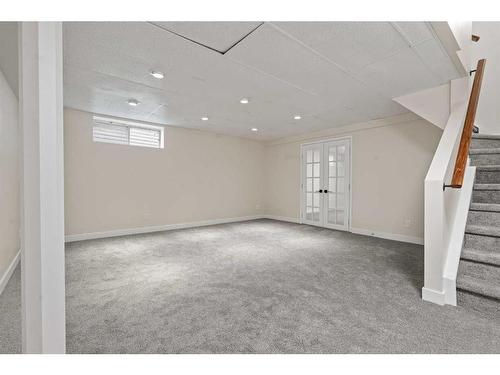 135 Mt Apex Crescent Se, Calgary, AB - Indoor Photo Showing Basement