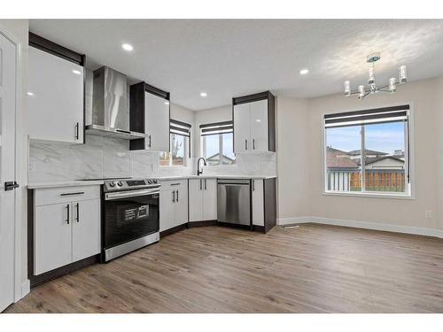 135 Mt Apex Crescent Se, Calgary, AB - Indoor Photo Showing Kitchen With Upgraded Kitchen