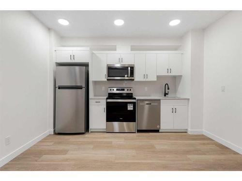 233 Spring Creek Circle Sw, Calgary, AB - Indoor Photo Showing Kitchen With Stainless Steel Kitchen