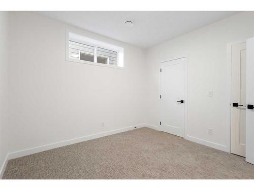 233 Spring Creek Circle Sw, Calgary, AB - Indoor Photo Showing Other Room