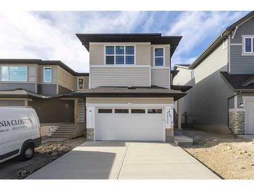 233 Spring Creek Circle Sw, Calgary, AB - Outdoor With Facade