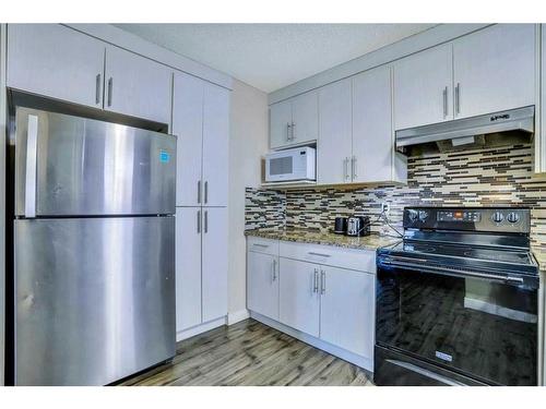 379 Whitman Place Ne, Calgary, AB - Indoor Photo Showing Kitchen With Stainless Steel Kitchen With Upgraded Kitchen