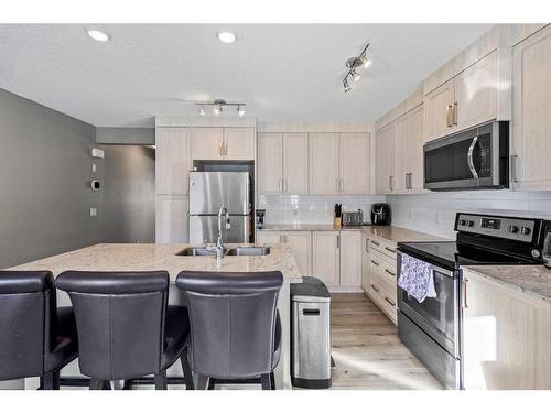 528 Sage Hill Grove Nw, Calgary, AB - Indoor Photo Showing Kitchen With Stainless Steel Kitchen With Double Sink