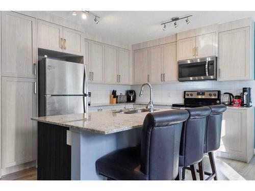 528 Sage Hill Grove Nw, Calgary, AB - Indoor Photo Showing Kitchen With Stainless Steel Kitchen With Double Sink