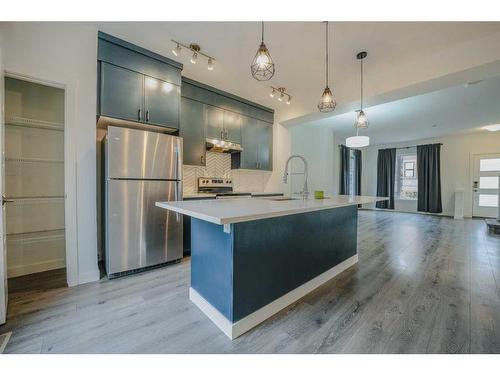 151 Livingston Common Ne, Calgary, AB - Indoor Photo Showing Kitchen With Stainless Steel Kitchen With Upgraded Kitchen